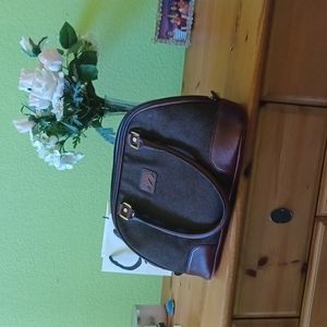 Brown bag with leather accents.